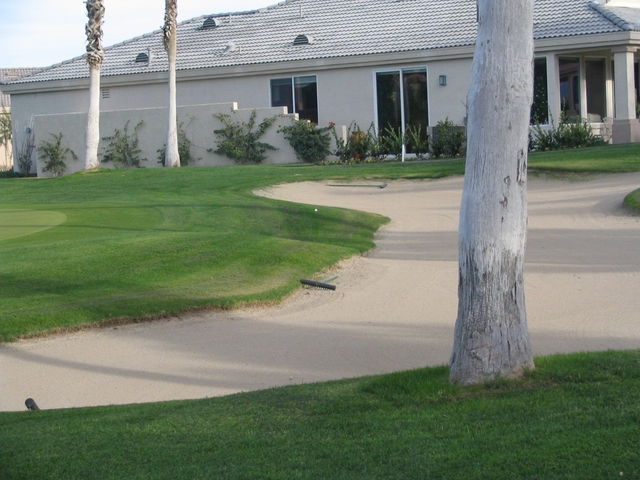 Desert Princess Country Club - Palm Springs area course - bunker/house