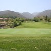 A view of the downhill par-3 7th hole at Glen Ivy Golf Club