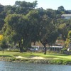 An inlet fronts the 166-yard, par-3 16th hole at Peacock Gap Golf Club in San Rafael.