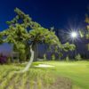 An evening view of a green at Don Knabe Golf Center & Junior Academy.