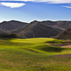 The green slopes from front to back on the third hole of the Shadow Course at Lost Canyons Golf Club.