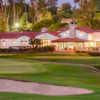 A view of a green and the clubhouse at Rancho Santa Fe Golf Club.