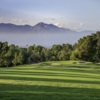 A view of a green surrounded by sand traps at Los Serranos Golf & Country Club.