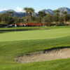 A sunny day view of a hole at Coral Mountain Golf Club.