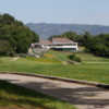 A view of a tee and the clubhouse in the distance at Petaluma Golf & Country Club.