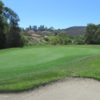 A sunny dya view of a green at Strawberry Farms Golf Club.