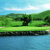 A sunny day view of a green t Wood Ranch Golf Club.