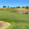 A sunny day view of a hole at Poppy Ridge Golf Course.