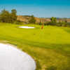 View of a green and bunkers at The Golf Club of California.