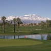 Indian Springs GC: #18 green in foreground with #15 green and hole on the other side of the lake. Mt. San Jacinto covered in snow in the background