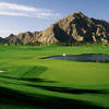 A view of a green with a bunker on the left at Cove Course  from Indian Wells Country Club.