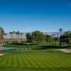 A view of a green flanked by bunkers at Ironwood Country Club