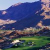 A view of the 18th hole with mountains in background at Stone Eagle Golf Club