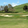 A view of green #3 protected by bunkers at River Island Country Club