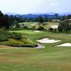 A view of green #11 protected by bunkers (courtesy of Farms Golf Club)