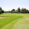 A view from a green with a bunker on the left side at Arrowhead Country Club