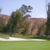 A view of a hole protected by a bunker at Shandin Hills Golf Club.