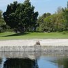 A view over the water of the 7th green at Rio Hondo Golf Club