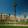 A view with narrow path in foreground at North Course from Indian Canyons Golf Resort