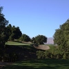 The par-3 16th at Eagle Ridge Golf Club is guarded by an imposing bunker.