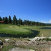 The 18th hole at Grizzly Ranch Golf Club is an uphill par 5 guarded by water.