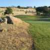 Large rocks guard the par-3 fourth at Whitney Oaks Golf Club