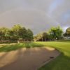 A view of green guarded by bunkers at Wilcox Oaks Golf Club