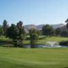 A view of green with water fountain in background at Simi Hills Golf Course