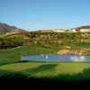 A view of the 17th green with water in background at The Crosby Club.