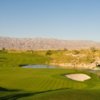 A view of a hole #18 with pond on the right side at Eagle Falls Golf Course
