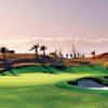 A sunny view of green #8 at Eagle Falls Golf Course