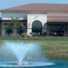 A view from Seal Beach Navy Golf Course with a water fountain in the foreground