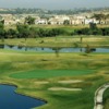 A view of a green protected by bunkers at Dos Lagos Golf Course