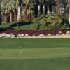 A view of a green flanked by bunkers at Thunderbird Country Club.