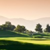 A sunny day view of a hole at Victoria Golf Course