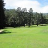 A view of the 5th hole flanked by sand traps at Mill Valley Golf Course