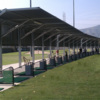 A view of the driving range tees at Glen Oaks Golf & Racquet Club