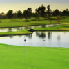 A view of a green with water coming into play at Alta Vista Country Club