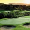 A view of a green protected by bunkers at Dove Canyon Country Club
