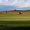 Players approach the 16th green on the Victoria Lakes Course at River Ridge Golf Club