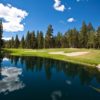 A view over the water of the 18th hole at Sierra Star Golf Club