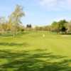 A view of a green protected by bunkers at Cherry Island Golf Course