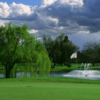 A view of a hole with a water fountain in background at Valley Hi Country Club.