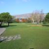 A view of a green protected by sand traps at Mission Hills of Hayward Golf Course