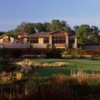 View of the clubhouse and the finishing hole at Whitney Oaks Golf Club