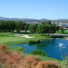 A view of the 15th green with water and bunkers coming into play at Spring Valley Lake Country Club