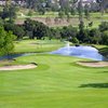 A view of hole #13 with water in background at Anaheim Hills Public Country Club