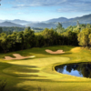 A view of the 13th green with water on the right side at Greenhorn Creek Golf Course