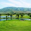 A green view with water in background at Sycamore Canyon Golf Course