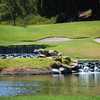 A view over the water of green at Enagic Golf Club at Eastlake